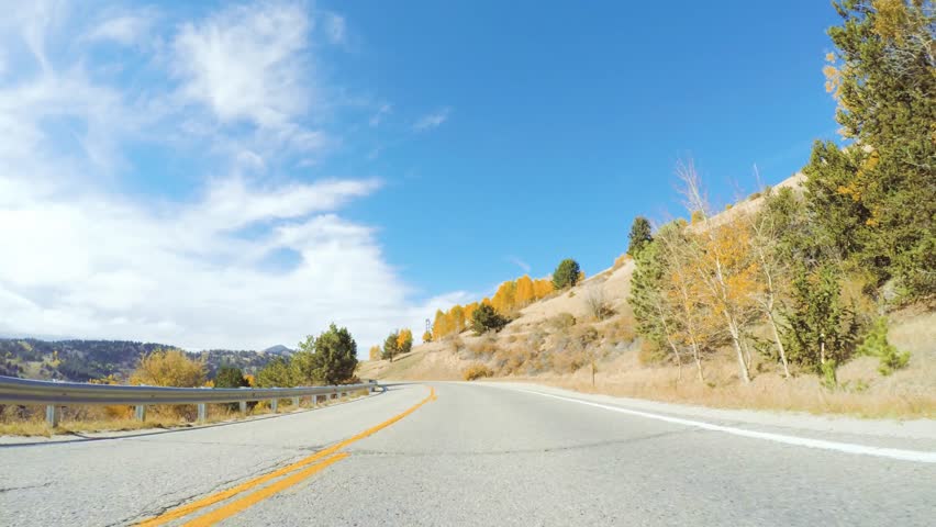 Driving on mountain highway 67 to Colorado Springs in Autumn.