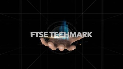 Hand Reveals Hologram Word-FTSE TECHMARK