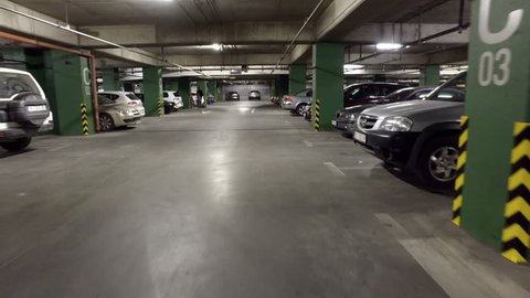 SKOPJE, MACEDONIA, circa MARCH, 2017: Timelapse of fast moving pov in underground car parking lot