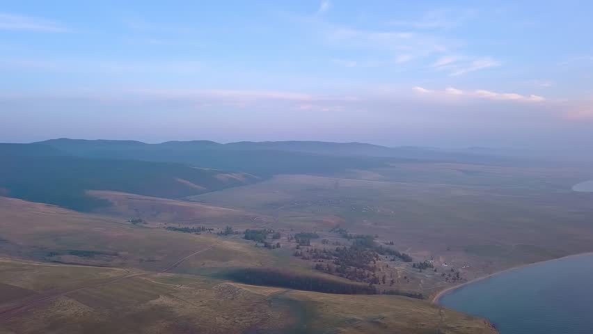 Russia, Lake Baikal, Olkhon Island, Sunset over Small Sea Bay, From Drone