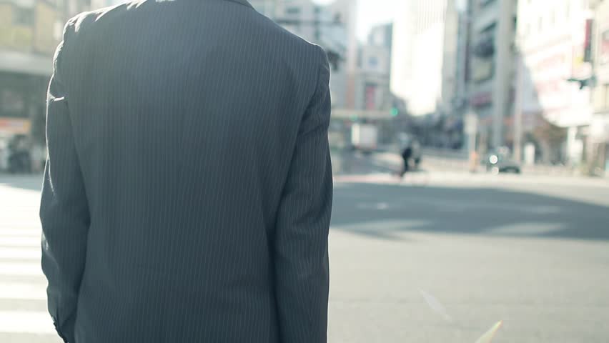 Walking businessman in Tokyo Royalty-Free Stock Footage #1019154388