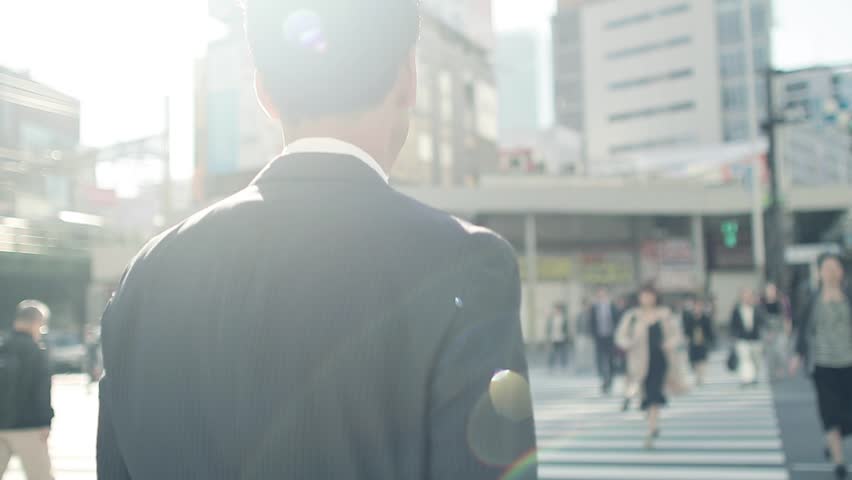 Walking businessman in Tokyo Royalty-Free Stock Footage #1019154388