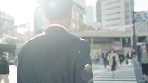 Walking businessman in Tokyo