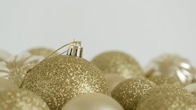 Assorted golden Christmas baubles  