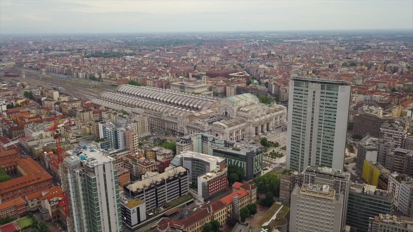 day time milan city train station district aerial panorama 4k italy