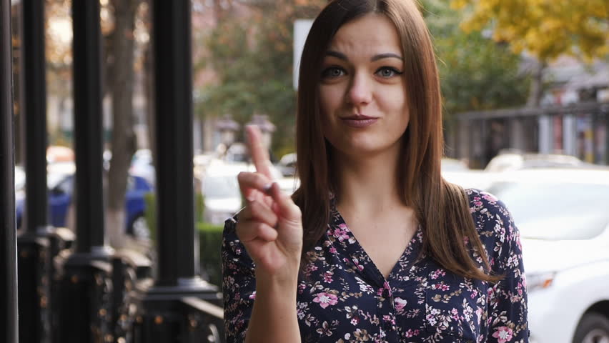 Young woman say no by shaking head and wagging her finger, rejecting gesture, disagree sign. Emotional face expression. Close-up portrait | Shutterstock HD Video #1019200273