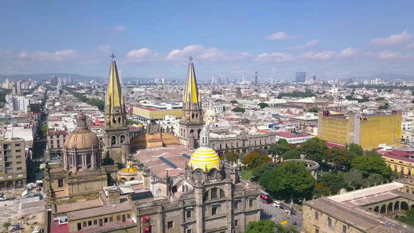Guadalajara Cathedral Filmed with 4k Aerial Drone Arc with City Skyline in Background. Main Church in Downtown Part of City