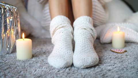Cozy Winter Fall Season, Warm Knitted Socks. Woman Relaxing At Home. Comfy Hygge Lifestyle.