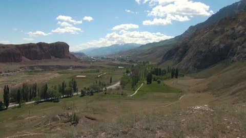 Murdash Village Alay Valley Kyrgyzstan Osh Region. A View of Alay Valley, Trans-alay Range, and Kyzyl-suu (West) River. Alay Mountains. Murdash Village Is 100 Km From Osh City.