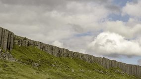 Time Lapse of a Cloudy Day over Cliffs in 4K (zoom out)