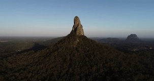 Aerial view of the Australian countryside. Beautiful footage of mountain as sunset and sunrise of the Queensland country.