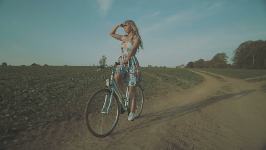 a girl riding a bike