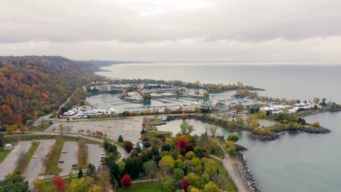Aerial footage tracking back along Scarborough Bluffs during peak fall colors.