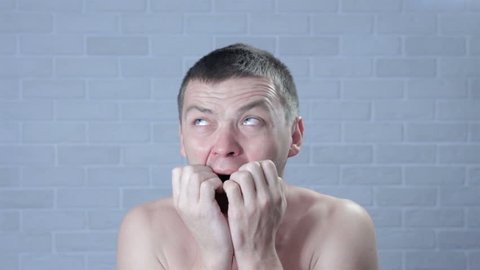 Embarrassed naked man Stock Video Footage - 4K and HD Video Clips