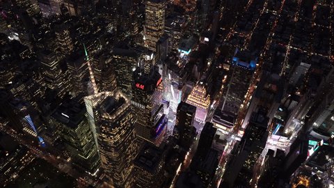 New York City Circa-2015, high angle aerial view flying across Times Square at night