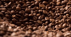 Falling Pouring Coffee Beans blurred background abstract close up macro shot 4K video