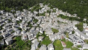 Panagia Village in the center of Thasos Island or Thassos, Greece aerial video footage shot using a drone in the summer
