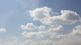 White big formating clouds time lapse, nature blue sky in horizon, nature summer sunny day fast moving in horizon, beautiful clear weather.