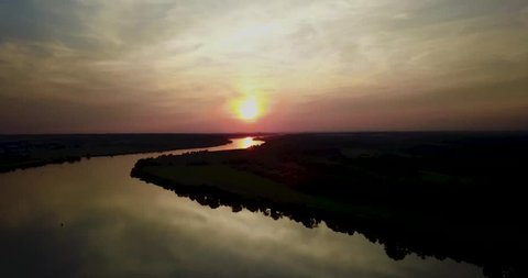 Beautiful landscape after sunset over the river in 4K