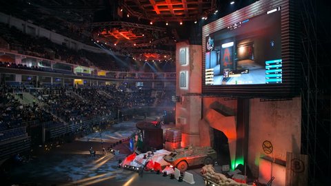 MOSCOW, RUSSIA - OCTOBER 27 2018: EPICENTER Counter Strike: Global Offensive esports event. Main stage, lightning, illumination, big screen with a game live stream on it.