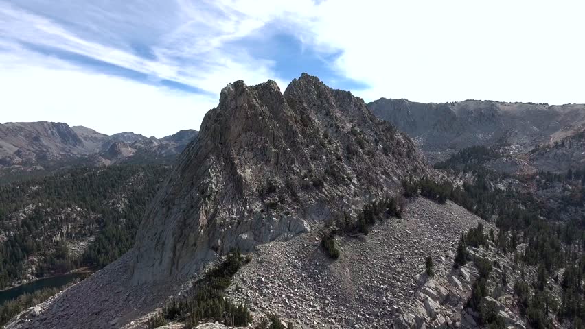 Aerial shot moving out from mountain in Mammoth Lakes, CA