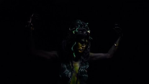 Mythical creature, Medusa Gorgon posing in the dark