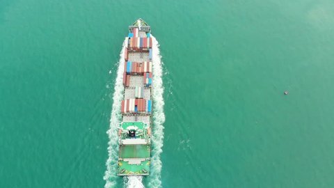 Commercial port with Logistics and transportation of Container Cargo ship and Cargo import/export and business logistics,Aerial view footage 
