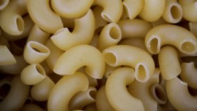 Elbow Macaroni pasta. Top view and Video rotation