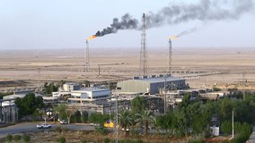 Flare burning gas in oil facilities that can be installed in Iran 2015 - Powered by Shutterstock - Get 15% off with code: PIKWIZARD15