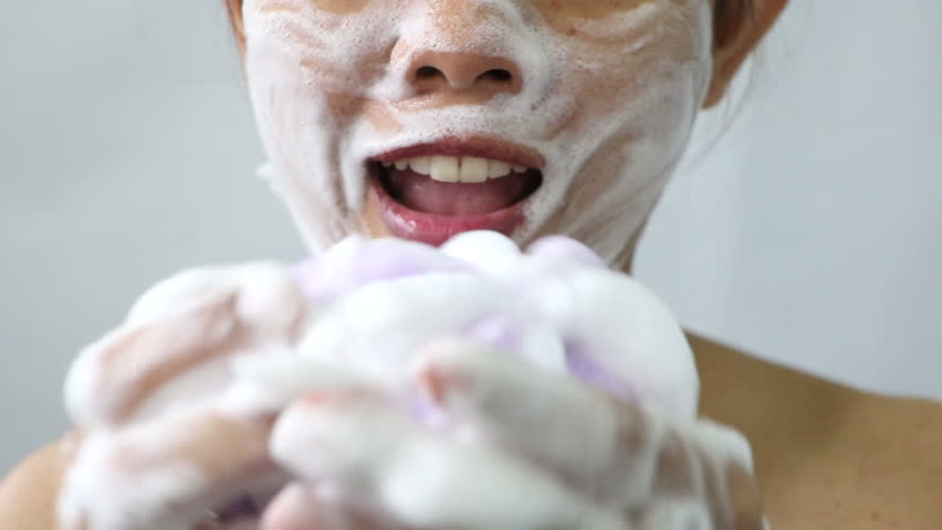 Close up Asian woman washing face by make bubble facial foam and cleansing her face skin | Shutterstock HD Video #1019378461