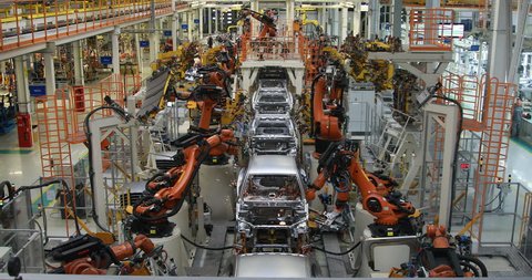 Borisov, Belarus - OCTOBER 31, 2018: Automobile plant. body of car on conveyor top view. Modern Assembly of cars at the plant. The automated build process of the car body