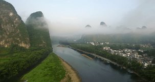 Aerial video in amazing asian landscape.
Flying over the clouds in a tipical asian landscape.