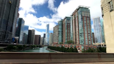 Chicago, USA - September 16, 2018: Driving a car through downtown at day time, observing architecture, city life