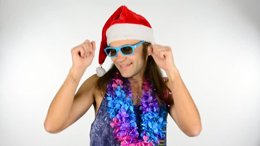 Hawaiian party, Christmas, New Year, birthday celebration and holidays concept. Beautiful young attractive smiling and dancing happy people. Studio shoot isolated on abstract blurred white background