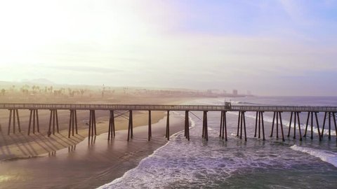 Rosarito Beach Pier lies on the coast of the Pacific Ocean on the Baja California Peninsula. The city is positioned between the foothills of the Peninsular Ranges and the ocean. 