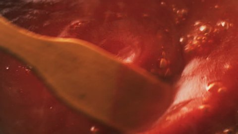 Sauce Cooking Red Tomato in a Boiling Pan and Stir Close up