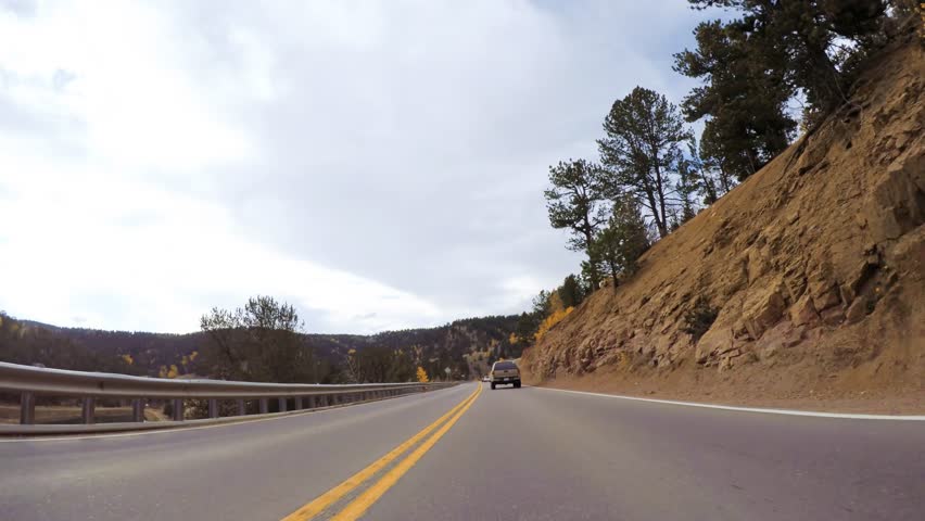 Driving on mountain highway 67 to Colorado Springs in Autumn.