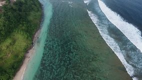 Aerial view: Sea water surface with waves.
