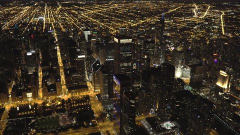 Chicago Circa-2015, aerial view of the Magnificent Mile at night featuring Grant Park and the Chicago Loop at night