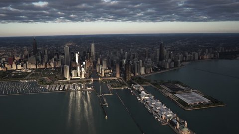 Chicago Circa-2015: Aerial view of Chicago Loop at sunrise with light rays reflecting off of the skyline and Lake Michigan