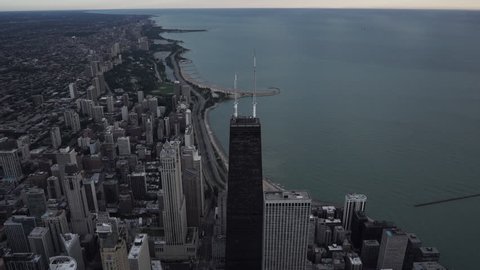 Chicago Circa-2015, aerial view flying over John Hancock center with Gold Coast and Old Town in the distance