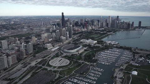 Chicago aerial view, flying away from Soldier Field with the city skyline in the background 