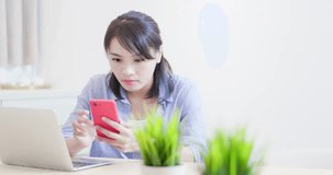 woman suffer internet cyber bullying and feel depressed with smart phone at home