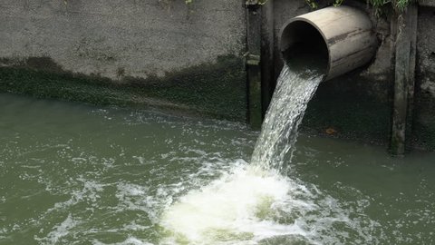 Storm water flows down the sewer into the canal
