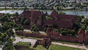 Aerial view of Castle of the Teutonic Order in Malbork, Malbork ( Zamek w Maborku, Ordensburg Marienburg ), largest by land in the world, UNESCO World Heritage Site, Poland