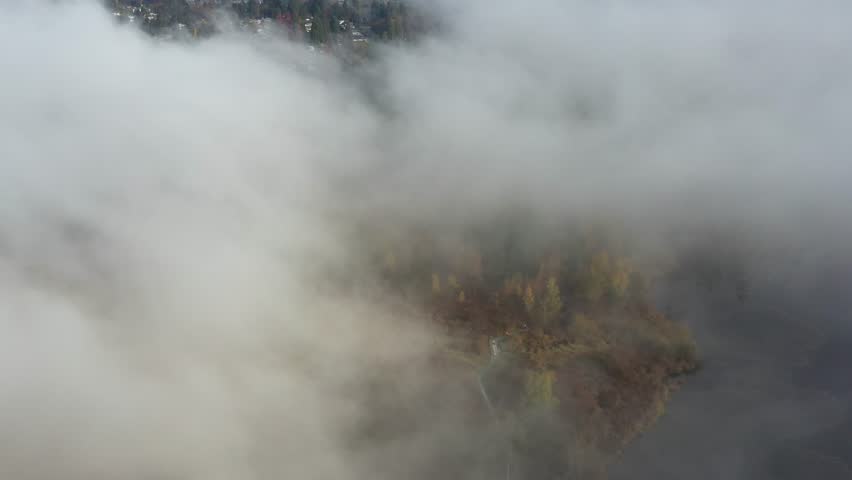 Beautiful mountain and forest lake in Vancouver, British Columbia, Canada. Drone flying aerial view. 4k.