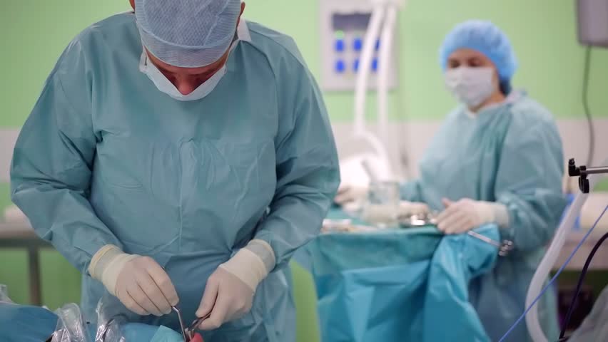 Doctor performing operation on a nosal cavity. | Shutterstock HD Video #1019508877