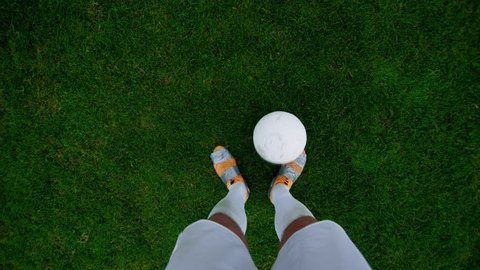 Point of View Shot of Professional Soccer Player Dribbling the Ball, overtaking His Opponents. POV with Focus on Legs.