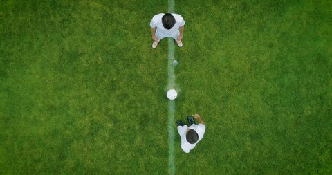 Aerial Top Down View of Soccer Field and Two Professional Teams Playing. Kick off Start of the Energetic Match on International Championship स्टॉक व्हिडिओ