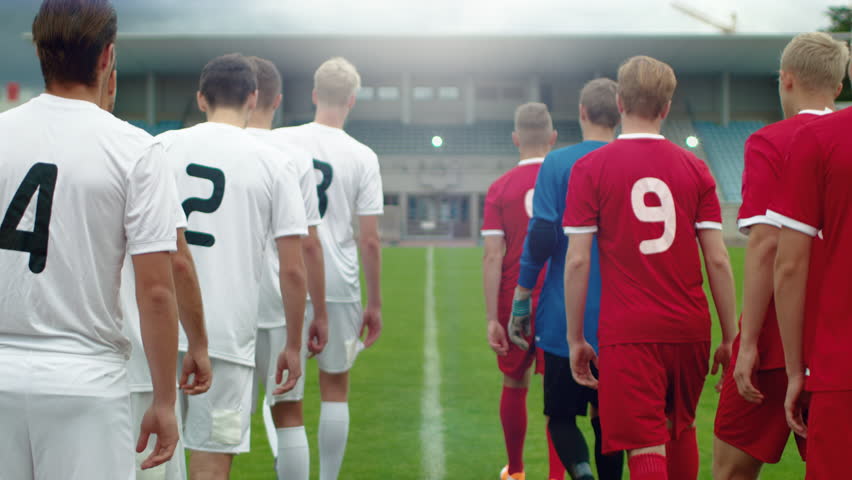 two-professional-soccer-teams-leaving-field-stock-footage-video-100